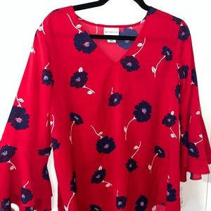 Red Liz Claiborne blouse with blue flowers and flutter sleeves. Size medium.